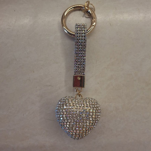 Keychain with rhinestones, new, silver color