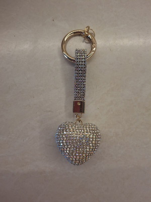 Keychain with rhinestones, new, silver color