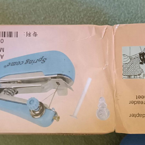 Portable handheld sewing machine like new, model OM888