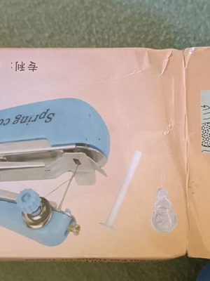 Portable handheld sewing machine like new, model OM888