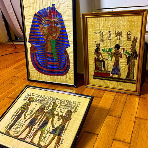 Set of framed real papyrus pictures with bronze or copper statue and marble lamp