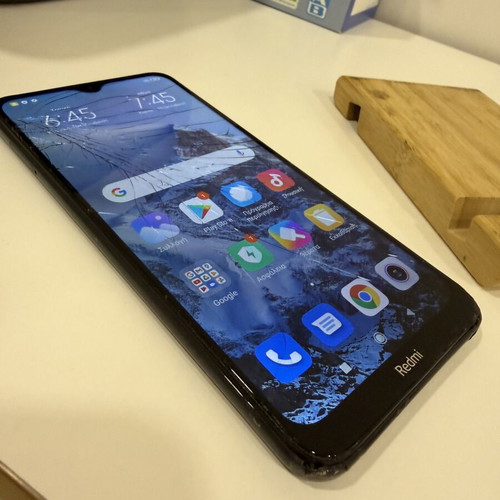 Xiaomi Redmi 8 smartphone used with cracked screen and damages