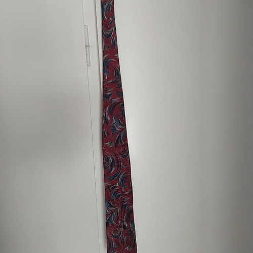 Canda tie used in red and blue shades