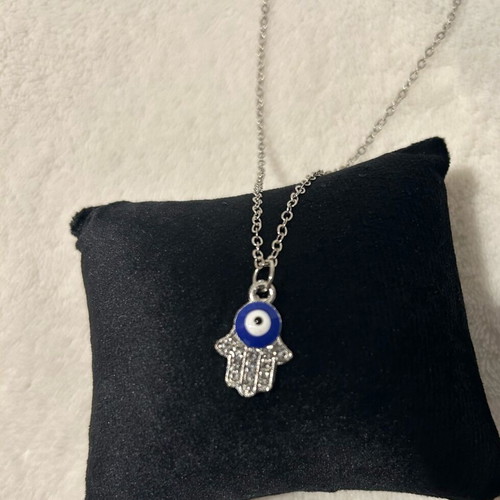 Handmade eye necklace in palm new