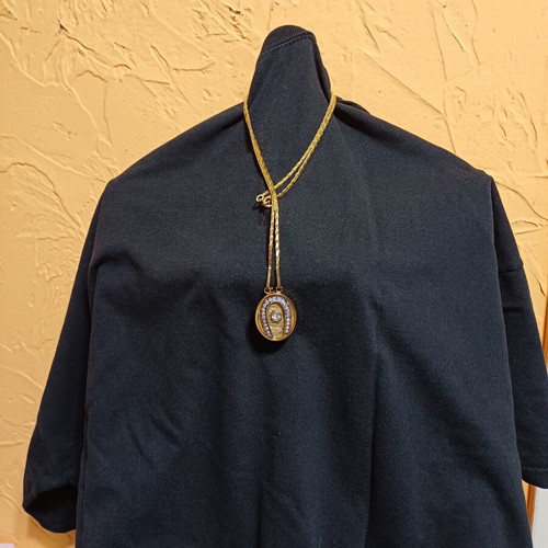 Pendant like new gold-tone horseshoe with zircon crystal