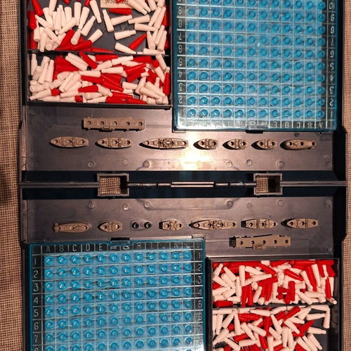 Board game used in plastic case, missing plastic ship