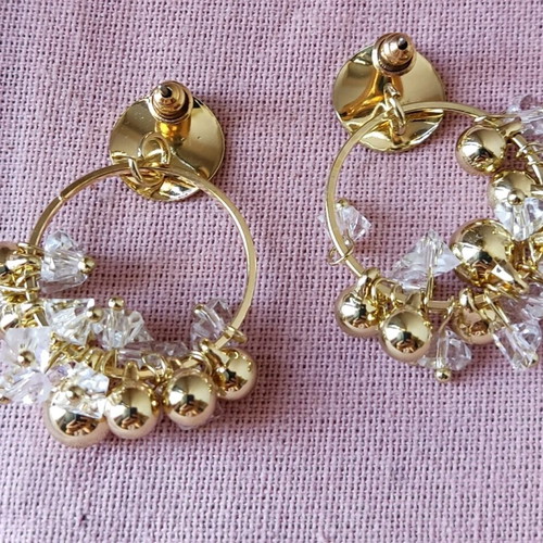 Metal hoop earrings with decorations like new, gold tone