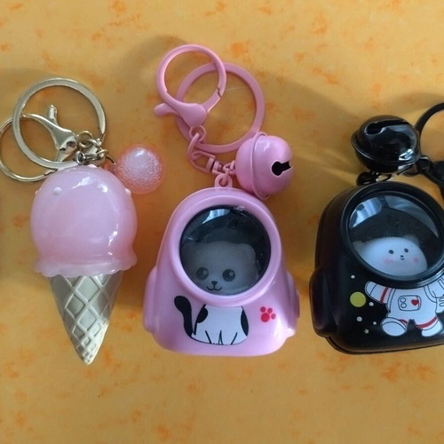 Illuminated keychains set of 3 like new, black and pink