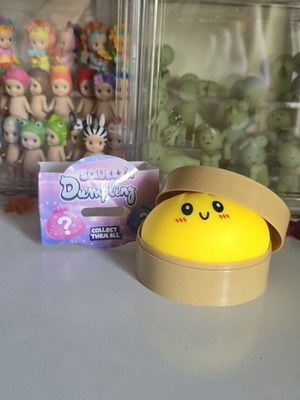 Squeeza Dumpling yellow squishy toy