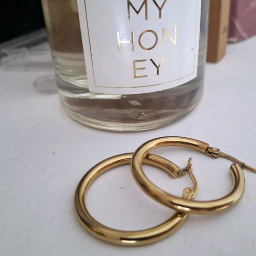 Steel Hoop Earrings like new, gold color
