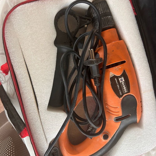 Globus impact drill used with large set of bits and sockets