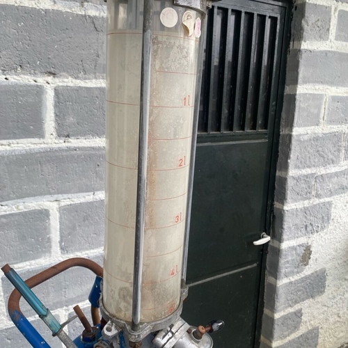 Oil and gasoline pump used with glass container