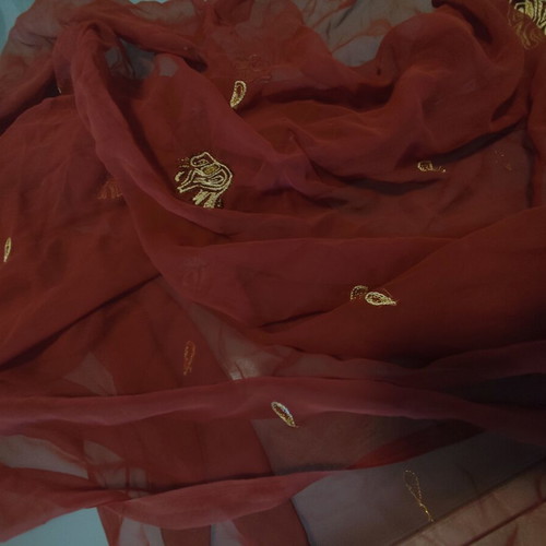 Long brown scarf used with embroidered elephants and paisley