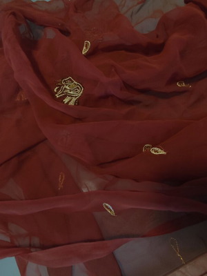 Long brown scarf used with embroidered elephants and paisley