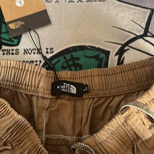 The North Face cargo shorts new with tags, size M, beige