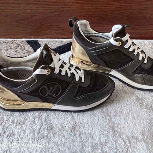 Louis Vuitton sneakers used size 38.5 with visible wear