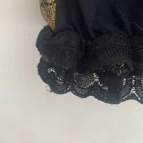 Top M Ake' black and gold used with lace detail