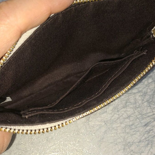 Coach wristlet bag used, beige with strap