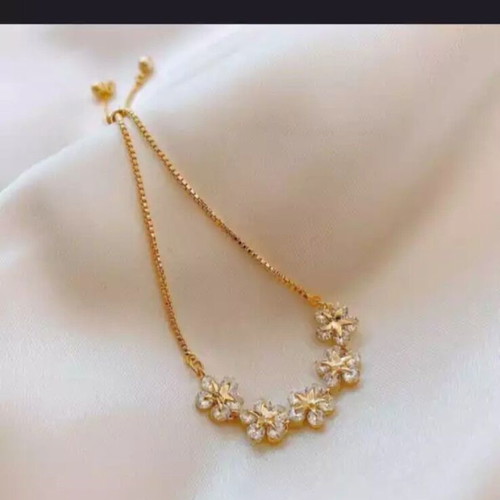 Delicate cubic zirconia bracelet new, gold and white