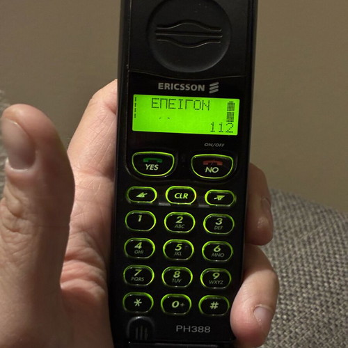 Ericsson 388 used, black, works with charger only
