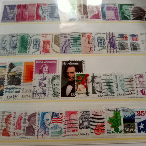 Stamp album with some stamps, mostly cancelled