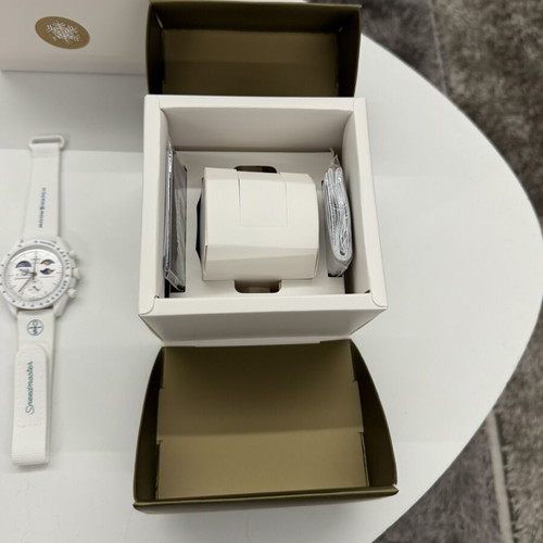 Swatch Omega Mission to Earthphase Moonshine Gold watch, white