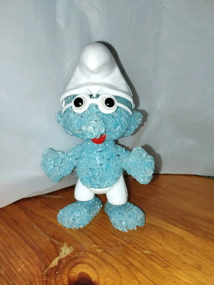 Smurf figure like new with batteries, possibly light-up
