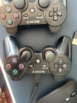 PlayStation 3 DualShock Six Axes Controller like new, two pieces