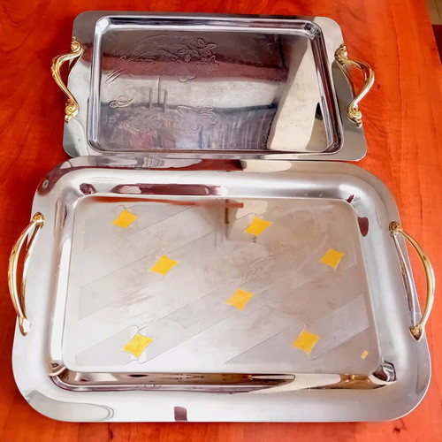 Set of three used serving trays, stainless steel inox 18/10 with gold details
