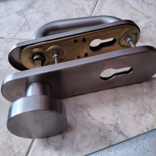 House door locks with handles and peephole