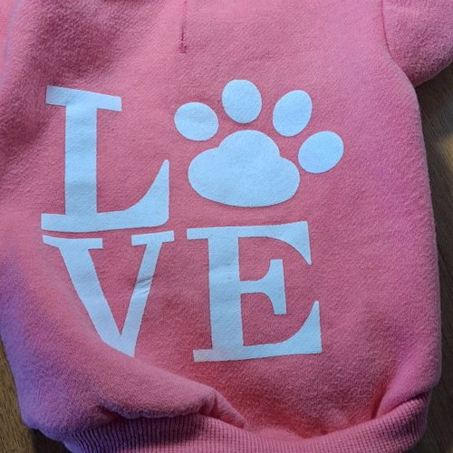 Dog accessory used, pink hoodie sweater