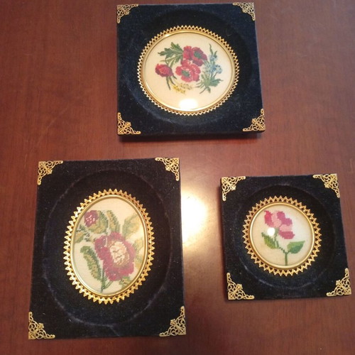 Set of 3 embroidered textile paintings in velvet frames