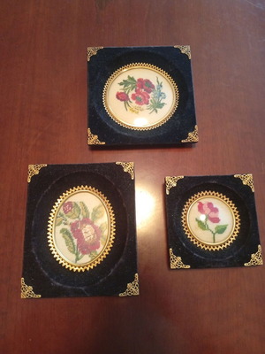 Set of 3 embroidered textile paintings in velvet frames