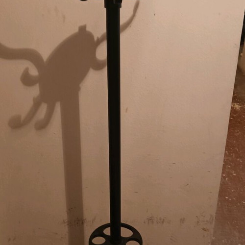 Coat hanger used with plastic hooks and weighted base