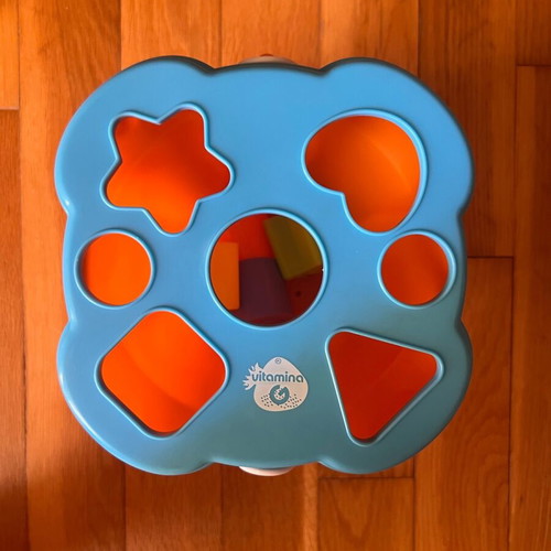 Beach bucket with shape sorting toy used