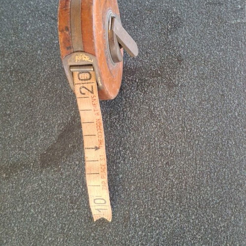 Vintage measuring tape 10 meters used, brass and leather