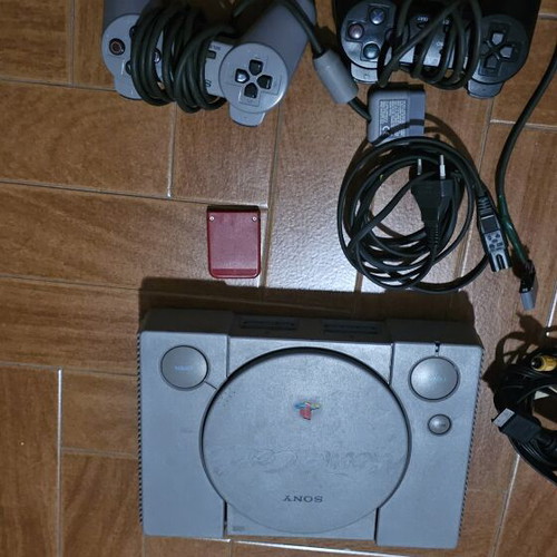 PlayStation 1 console with 2 controllers