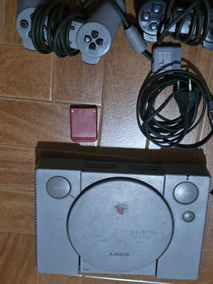 PlayStation 1 console with 2 controllers