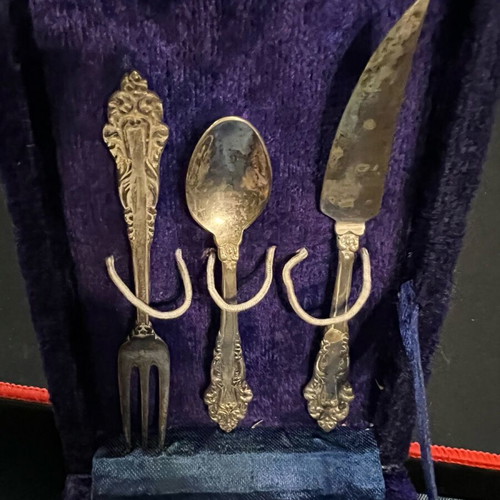 Antique silver-plated cutlery set used, knife fork and spoon in velvet box