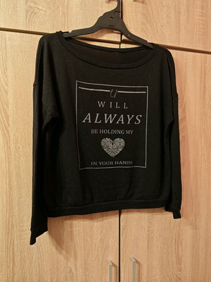 Girls' black T-shirt used, size L