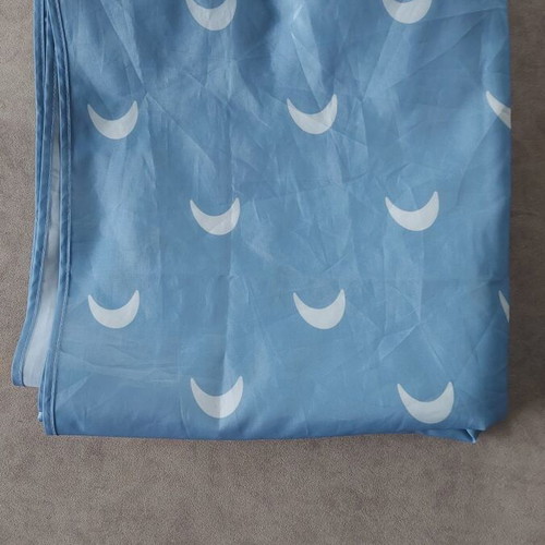 Protective floor mat used, blue 130x130 with moon pattern