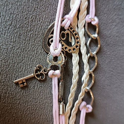 Love bracelet set new with white and pink cords and charms