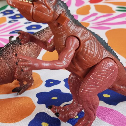 Plastic dinosaur toys used, all together