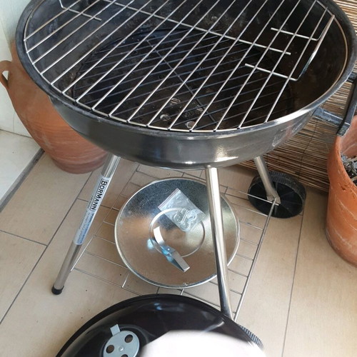 Bormann Charcoal Grill used with wheels and shelf