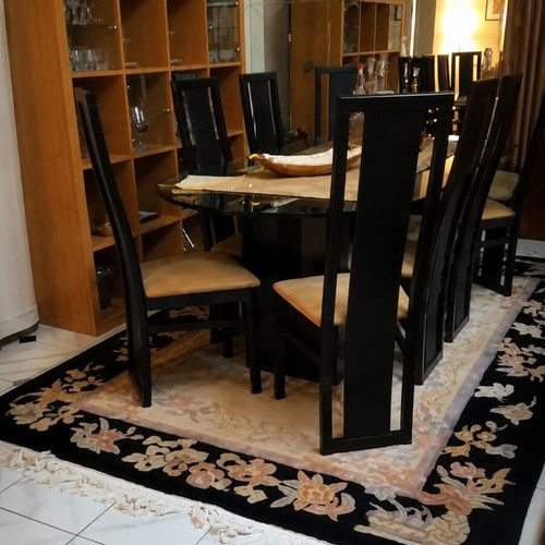 Dining set with glass table and wooden black base like new, 8 seats