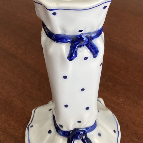 Vintage porcelain candlestick with blue bows and dots, used, damaged