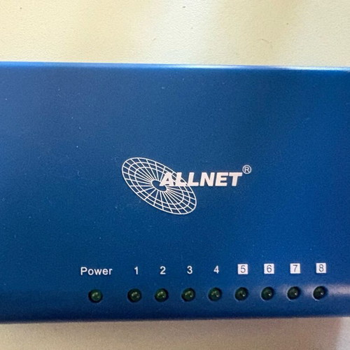 ALLNET 8-Port Network Switch used with power adapter model ALL8089