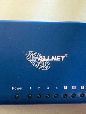 ALLNET 8-Port Network Switch used with power adapter model ALL8089