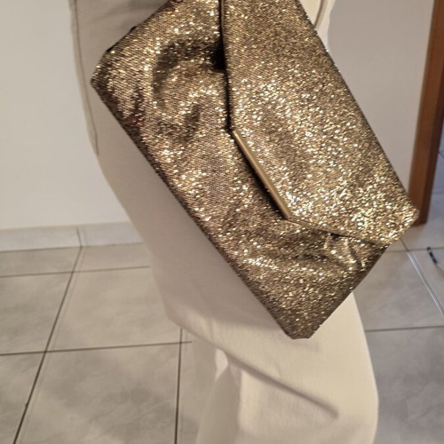 Clutch bag with subtle gold shimmer, like new