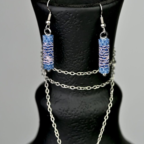 Custom-made jewelry set in light blue tones with hexagonal pendant